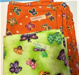 24 pieces of pre-cut fabric -- orange or green with butterflies 19